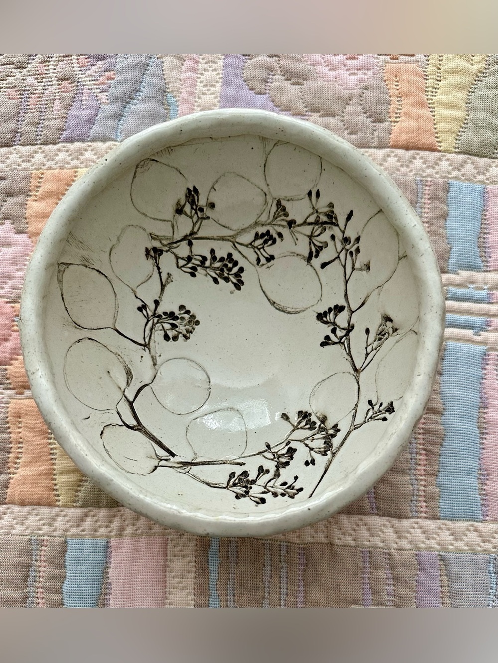 Handcrafted Rustic Cream Pottery Bowl with Black inlaid Botanical Design